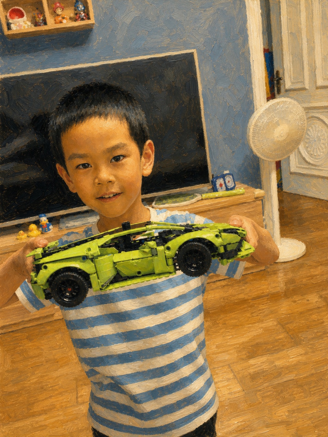 Little Ares proudly holding a green building-block race car he completed
